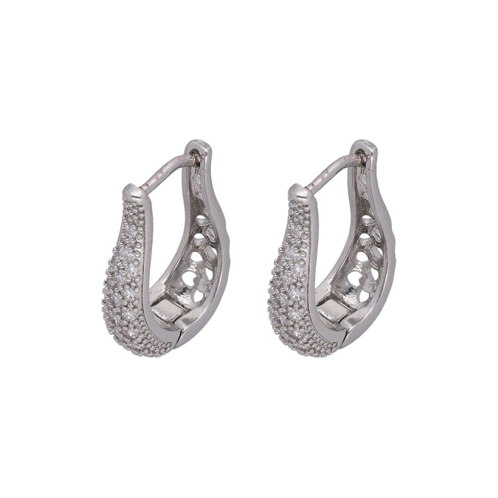 Silver hoop earrings with crystal accents and textured design on white background